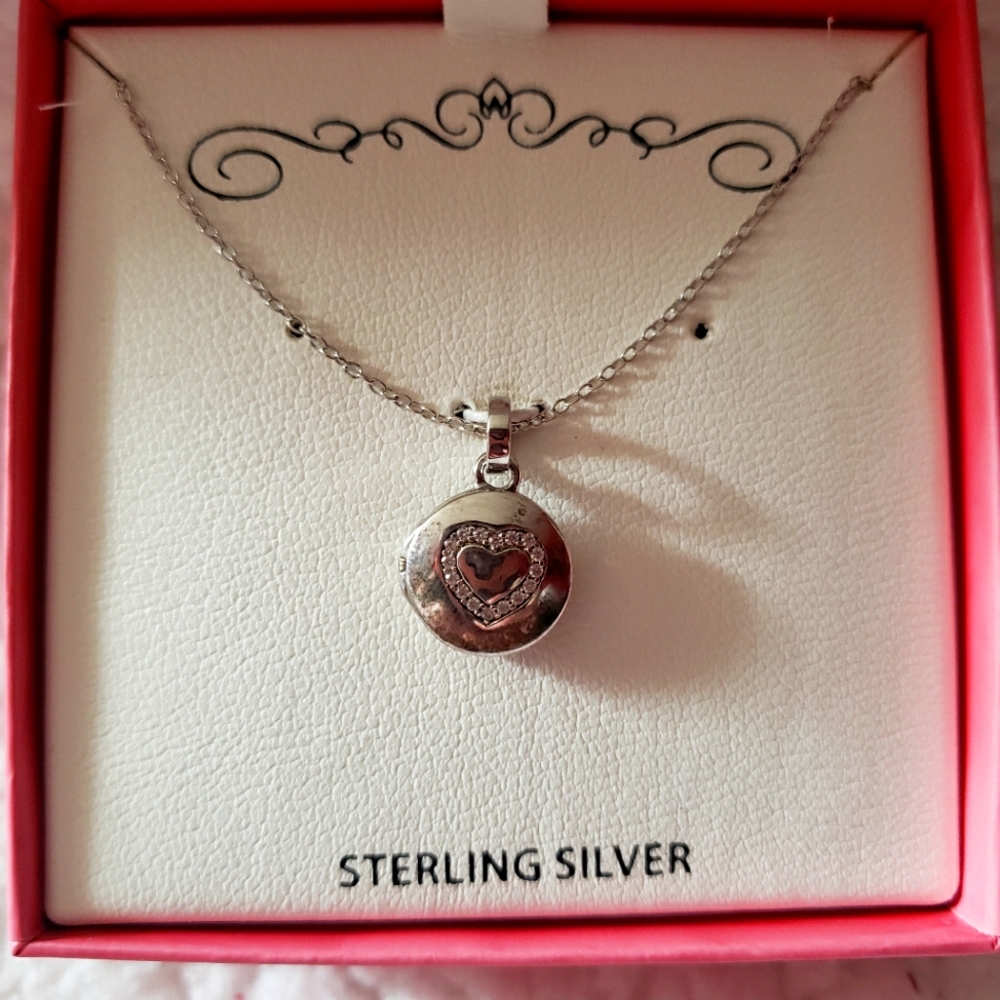 Childrens sterling silver little locket necklace.